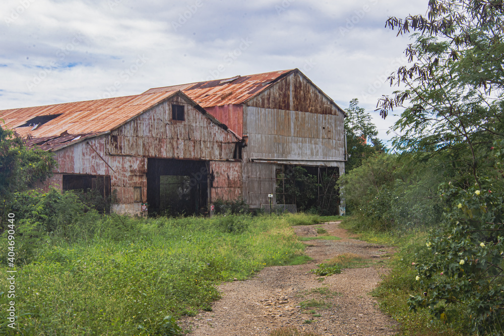 Ruins of an old sugar mill in Salinas, Puerto Rico, USA. Following the. decline of the sugar industry, the shorefront land was acquired by the Jobos Bay National Estuarine Research Reserve. Ruins of an old sugar mill in Salinas, Puerto Rico, USA. Following the. decline of the sugar industry, the shorefront land was acquired by the Jobos Bay National Estuarine Research Reserve.