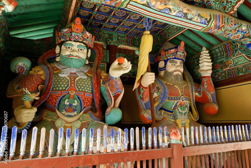 Near Gyeongju, temple guardians decorate an entryway at Girimsa, South Korea's second largest Buddhist temple after Bulguksa. photo