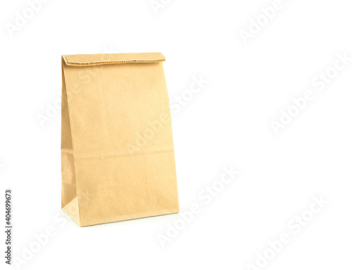 Brown kraft paper bag isolated on a white background..