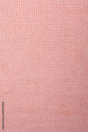 Rose wool knitted fabric, hand knit, plain knitting, vertical photo