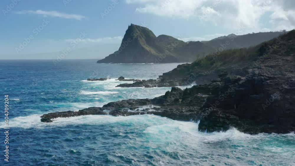 Cinematic ocean shore background. Aerial drone flying over stormy Pacific ocean waters. Scenic rocky coastline nature panorama. Pure wilderness and adventure travel footage. Hawaii, Maui, USA travel Cinematic ocean shore background. Aerial drone flying over stormy Pacific ocean waters. Scenic rocky coastline nature panorama. Pure wilderness and adventure travel footage. Hawaii, Maui, USA travel