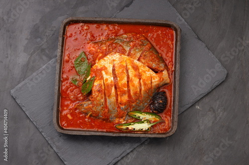  White pomfret masala curry photo