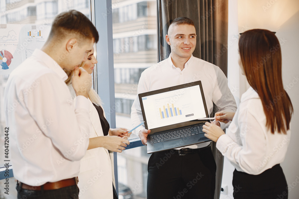 People create a new project. Team working in a office. Businesspeople with documents. People create a new project. Team working in a office. Businesspeople with documents.