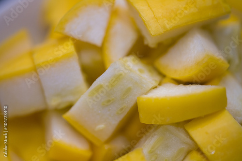 close up of slices of yellow fruit