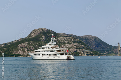 Mega yachtanchored off the shores of Gerainger in the fjords of Norway