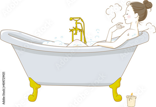 Woman taking a bath relaxing in the bathtub