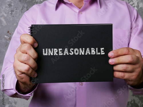  Financial concept about UNREASONABLE with phrase on the page.