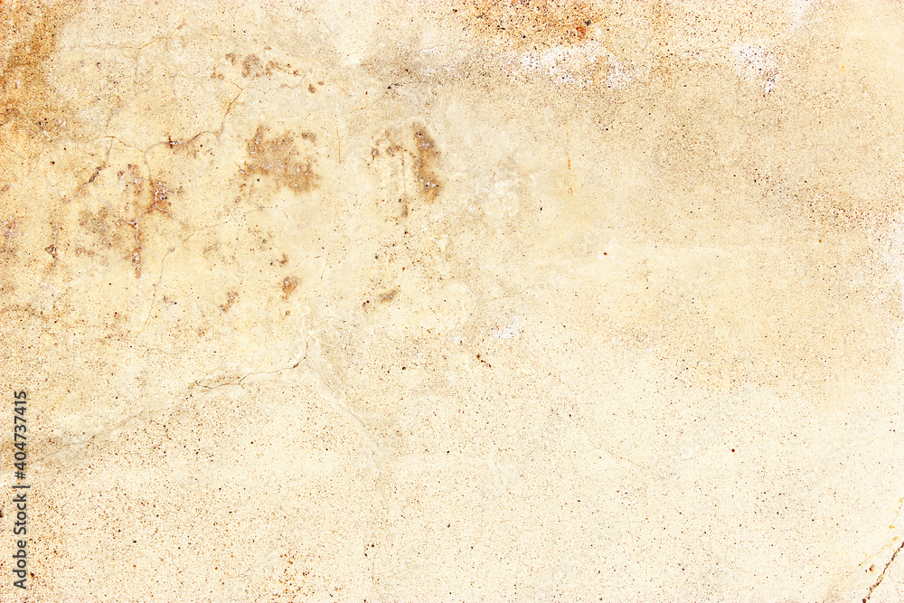 Fototapeta premium metal painted with paint in gold color. rust and scratches. Rusty metal wall, painted metal with rust texture. Rusty metal background with streaks of rust. Rust stains. Metal surface with rusty stains