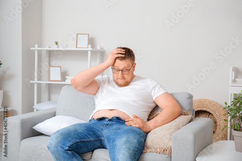 Stressed overweight man in ...