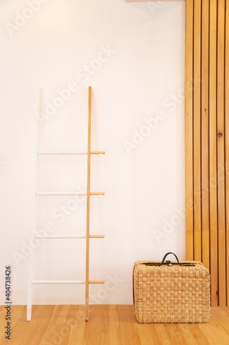 wooden staircase and travel backpack in vintage room.