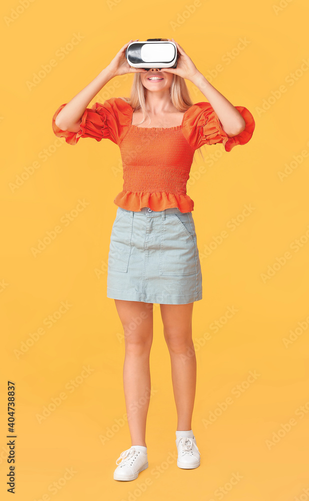 Teenage girl with virtual reality glasses on color background Teenage girl with virtual reality glasses on color background