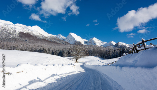 Photography beautiful snow capped mountains on a cold winter day