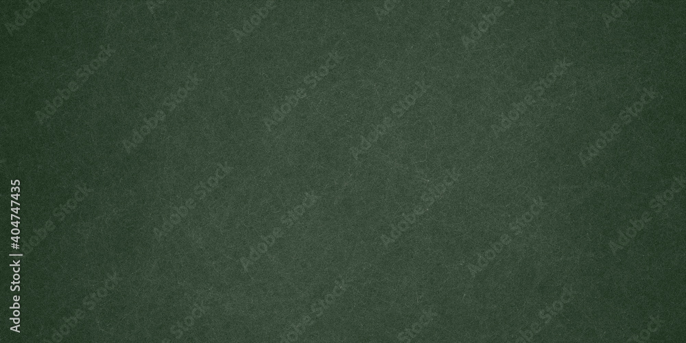 Elegant dark emerald green background with black shadow border and old vintage grunge texture design Elegant dark emerald green background with black shadow border and old vintage grunge texture design