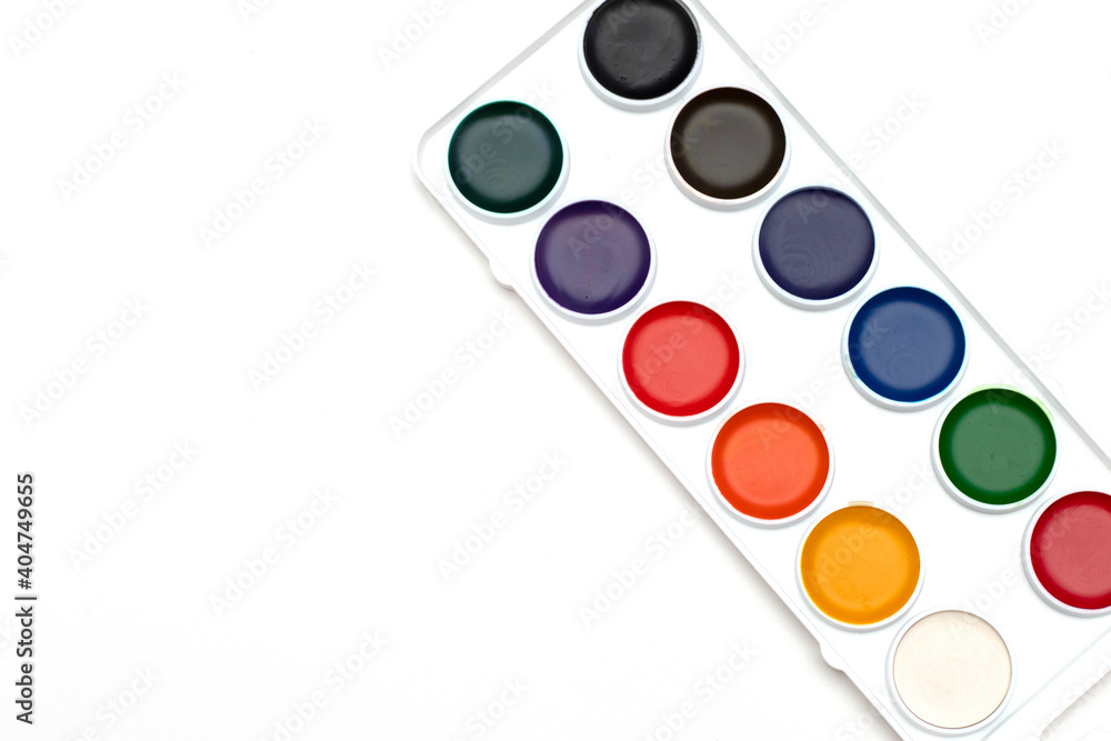 palette of watercolor paints on a white background. artist concept. place to place text palette of watercolor paints on a white background. artist concept. place to place text