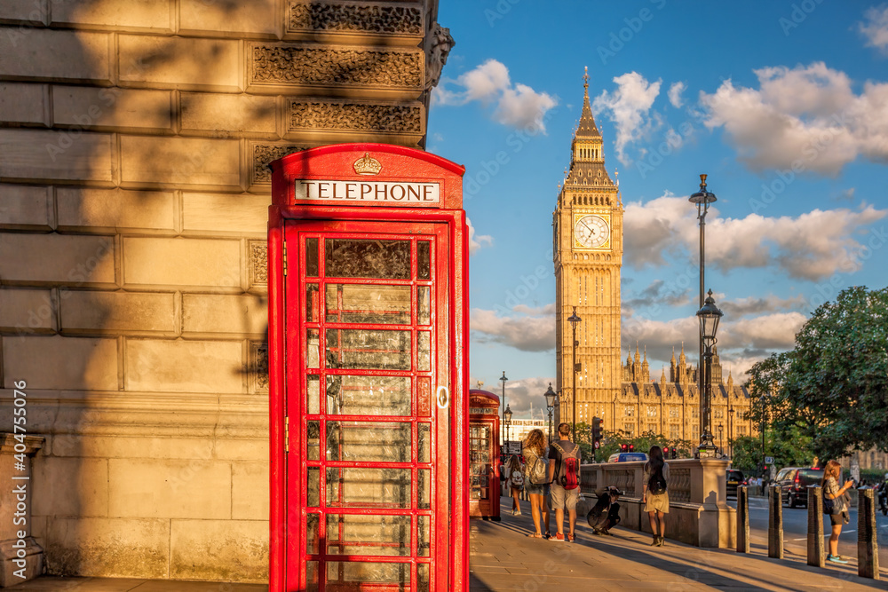 Big Ben with red phone booth in London, England, UK