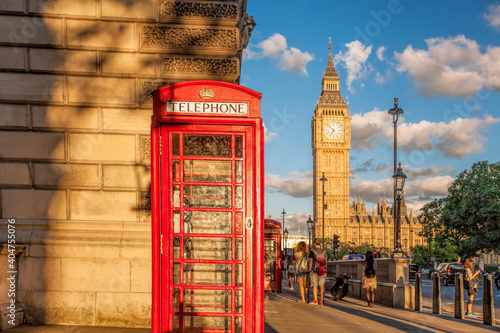 Big Ben with red phone booth in London  England  UK