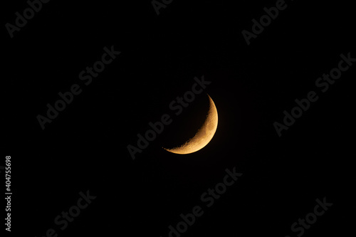 Young Moon photographed through a long focal telescope.