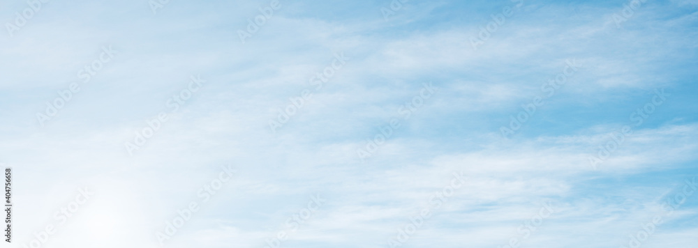 Summer Blue Sky and white clouds background. Beautiful clear cloudy in sunlight spring season. Panorama vivid cyan cloudscape in nature environment. Outdoor horizon skyline with spring sunshine.