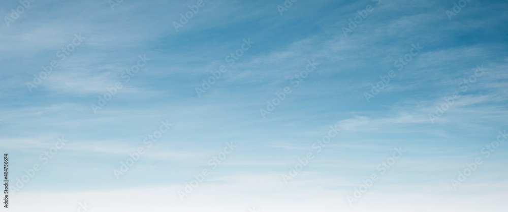 Summer Blue Sky and white clouds background. Beautiful clear cloudy in sunlight spring season. Panorama vivid cyan cloudscape in nature environment. Outdoor horizon skyline with spring sunshine. Summer Blue Sky and white clouds background. Beautiful clear cloudy in sunlight spring season. Panorama vivid cyan cloudscape in nature environment. Outdoor horizon skyline with spring sunshine.