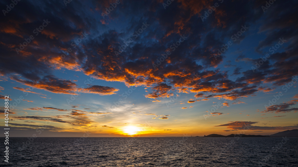 wide angle shot of beautiful sunset on tropical sea at summer time from tilt-shift lens in full hd ratio