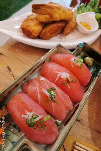 Closeup of fresh sushi on on ceramic dish  Japanese food