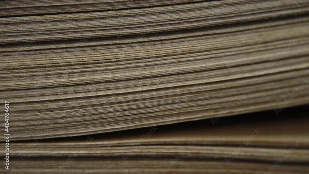 Leafing through the pages of an old book. Macro shot of pages of an ancient book to understand a concept Leafing through the pages of an old book. Macro shot of pages of an ancient book to understand a concept