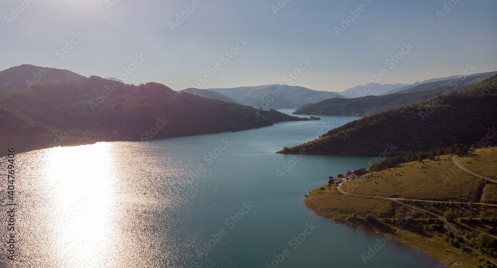 Aerial view of meandering Zavoj Lake, drone photography