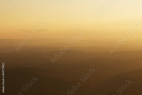 background of mountains in yellow light