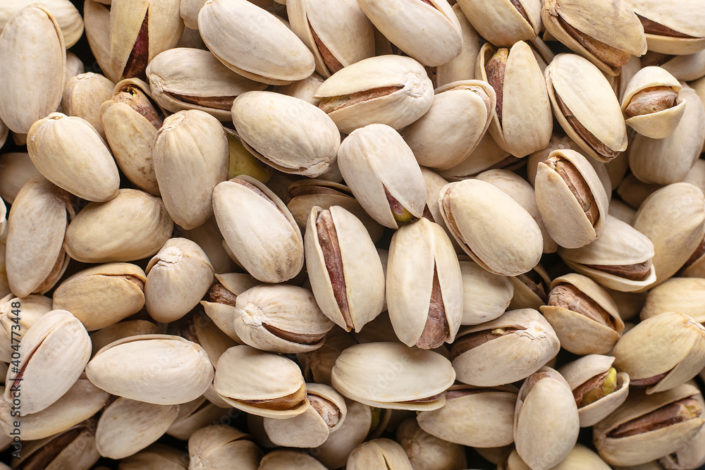 Salted pistachios close up. Texture, background. Salted pistachios close up. Texture, background.