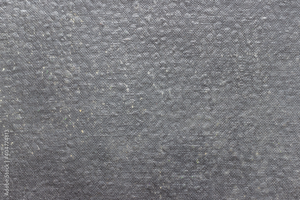 The texture of old worn faded cardboard. The texture of old worn faded cardboard.