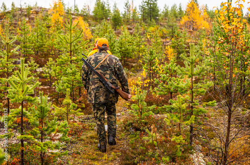 Hunter outdoor in the wilderness during hunting season © RobertNyholm
