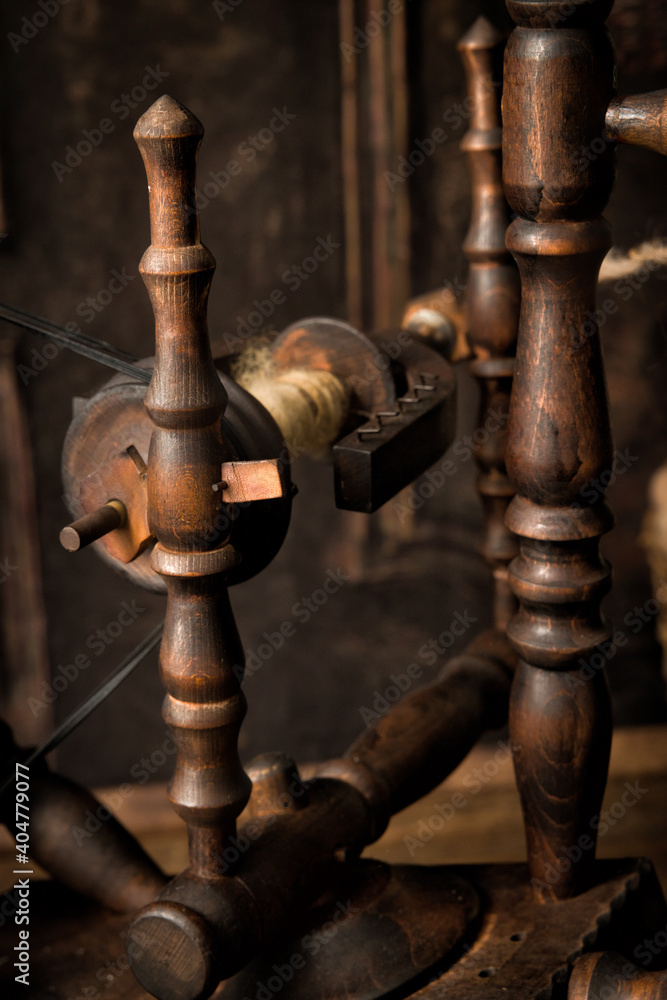 Closeup of antique spinning wheel Closeup of antique spinning wheel