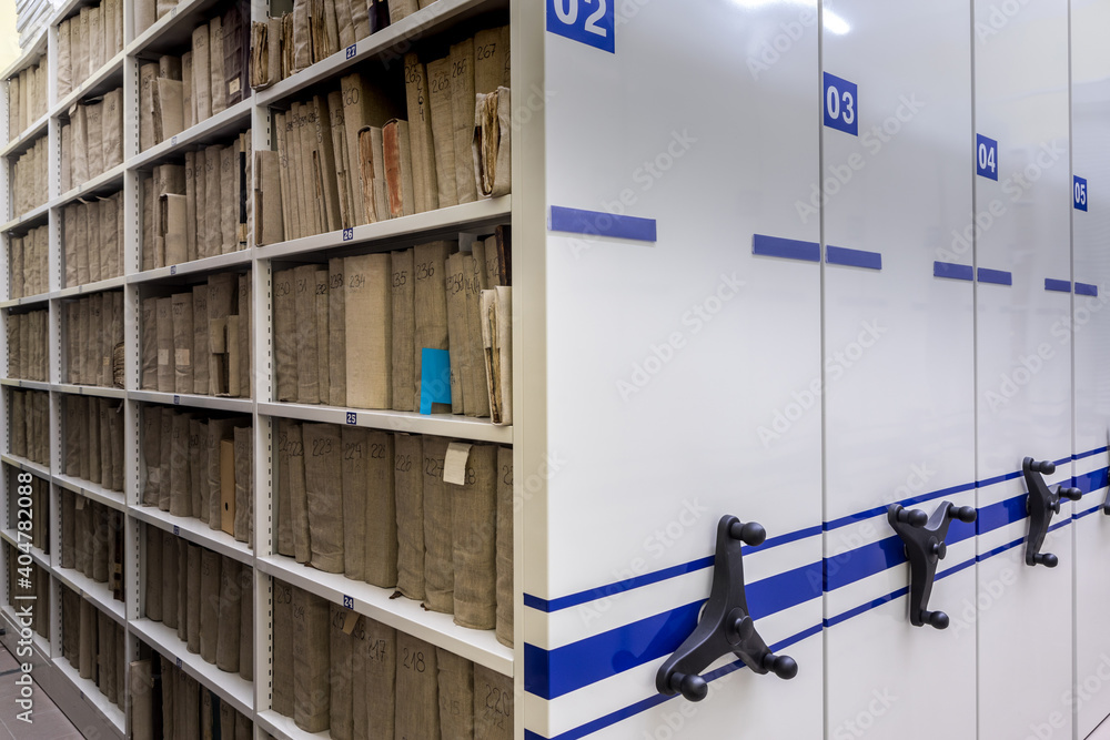 archive, file, registration , mobile shelves with documents. Archive or office - obrazy, fototapety, plakaty 