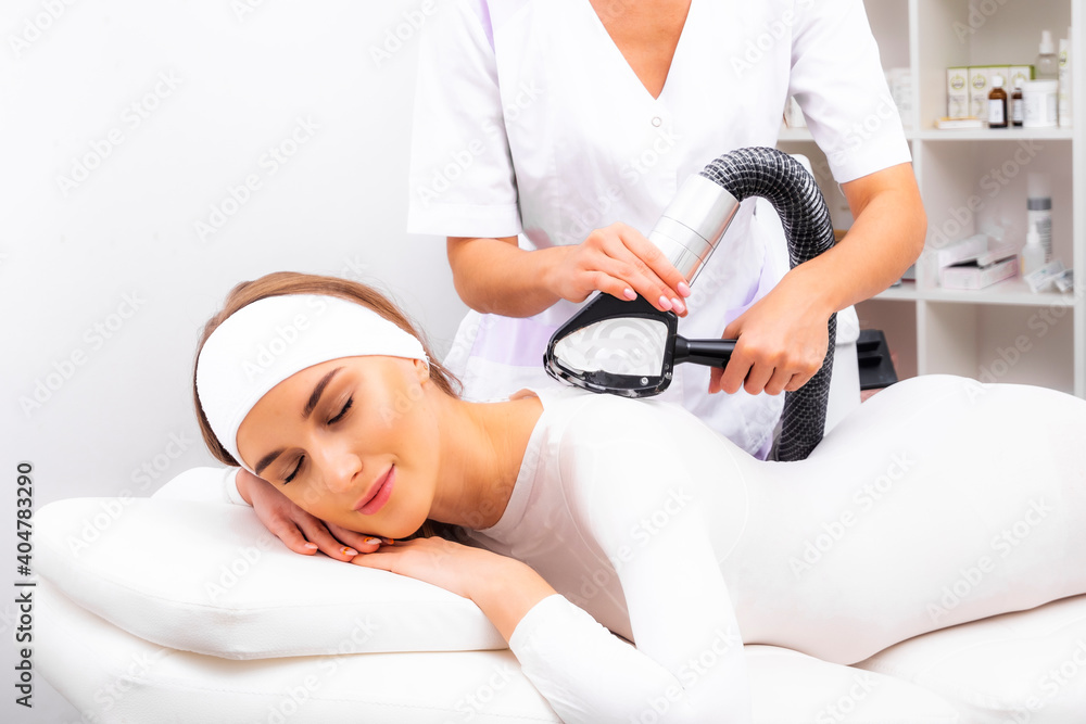 Anticellulite lpg body massage. Fat burning procedure cavitation. Hardware body correction