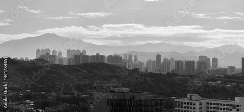 silhouette city skyline and mountain. landscape of Hong Kong at dawn