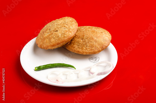 Kachori is a spicy snack from India also spelled as kachauri and kachodi.