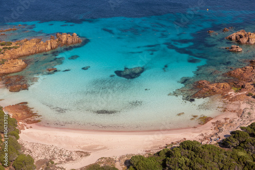 Aerial view of the famous Pink Beach in Arcipelago La Maddalena, Sardinia, unique image high resolution from helicopter