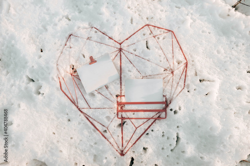 Pink heart in snow / winter cards letter 