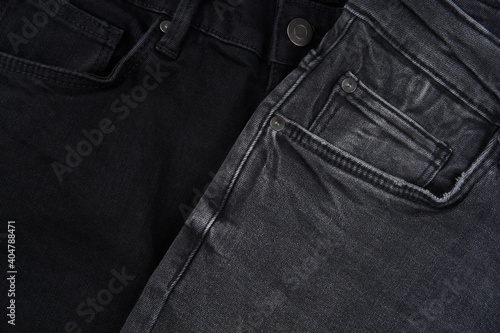 Stack of Various Shades Of Blue Jeans On White Background Denim jeans texture. Denim background texture for design. Canvas denim texture. Blue denim that can be used as background.