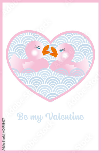 Be my Valentine - two cute ducks swimming in the sea of love