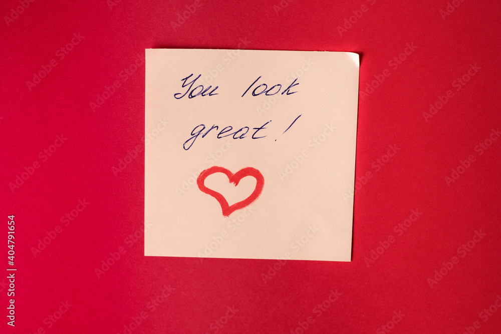 Sticker with love words written by pen, drawn heart and compliments for valentine s day at red background.
Sticker with love words written by pen, drawn heart and compliments for valentine s day at red background.