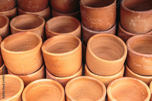 Flower pots that are stacked in layers.
