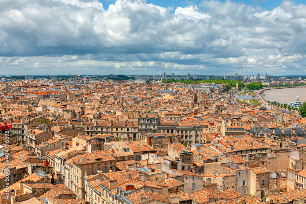 Bordeaux aerial cityscape . Panorama of old french town  . Aerial view of red tiled rooftops in the city 