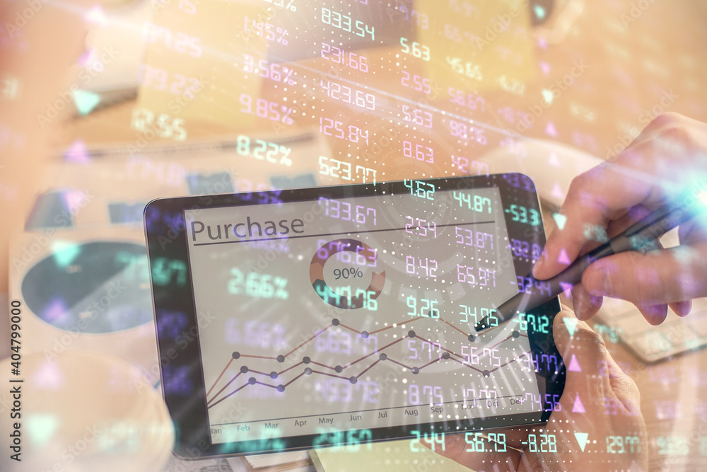 Double exposure of man's hands holding and using a phone and financial chart drawing. Market analysis concept. Double exposure of man's hands holding and using a phone and financial chart drawing. Market analysis concept.