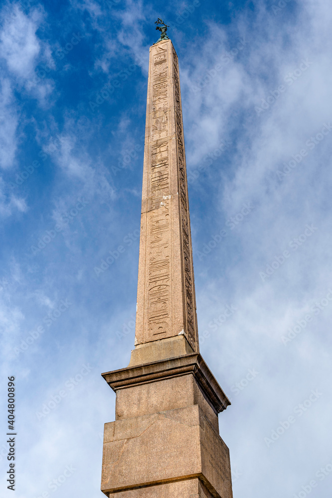 Ancient Egyptian obelisk on top of Gian Lorenzo Bernini's baroque 1651 Four Rivers Fountain located in the center of Navona square in Rome, Lazio, Italy