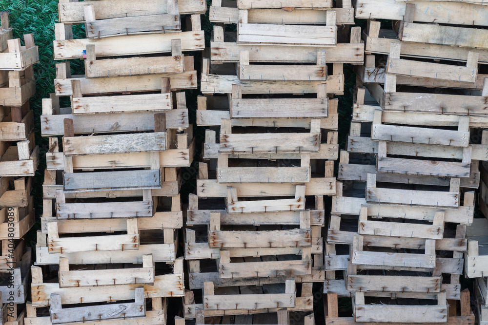 wooden empty fruit boxes stacked on top of each other wooden empty fruit boxes stacked on top of each other
