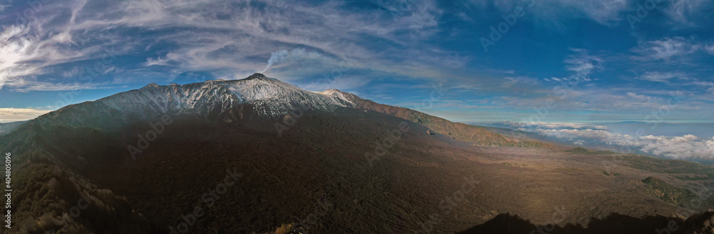 Panoramic view in virtual reality at 180 degrees of the Etna volcano with its lava flows and the Bove valley in autumn. Sicily Italy.
