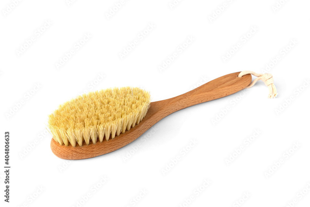 Wooden massage brush isolated on white background. Wooden massage brush isolated on white background.