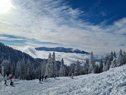 Winter time with lens glare at Poiana Brasov ski resort in Romania