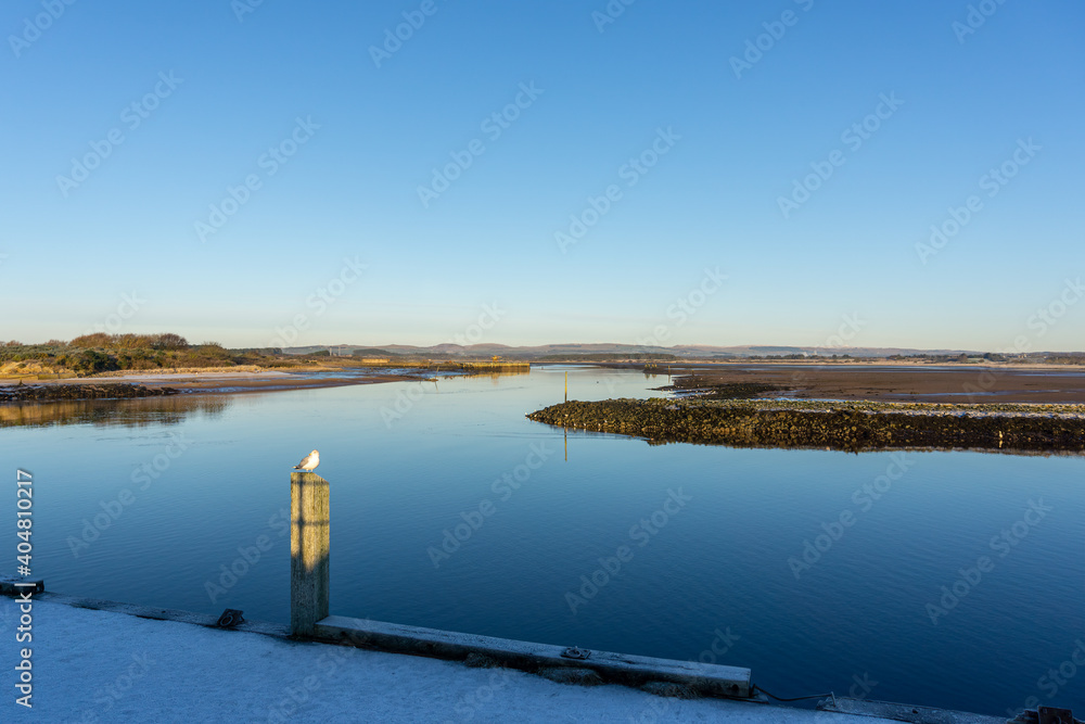 Harbour Street Irvine North Ayrshire Scotland on a bright but cold day in January looking over the Ardeer Peninsula to the Ayrshire Hills in the far Distance. Harbour Street Irvine North Ayrshire Scotland on a bright but cold day in January looking over the Ardeer Peninsula to the Ayrshire Hills in the far Distance.